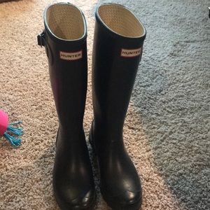 Black tall hunter rain boots